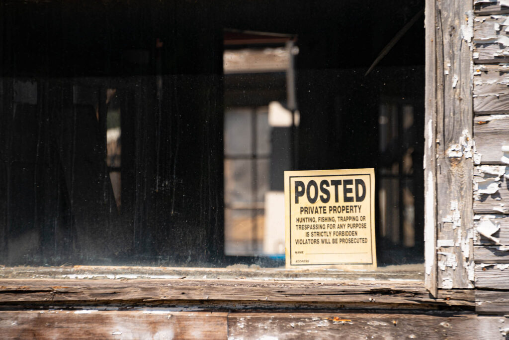 A No Trespassing sign in Washtucna, Washington guards a building with no contents and no value.