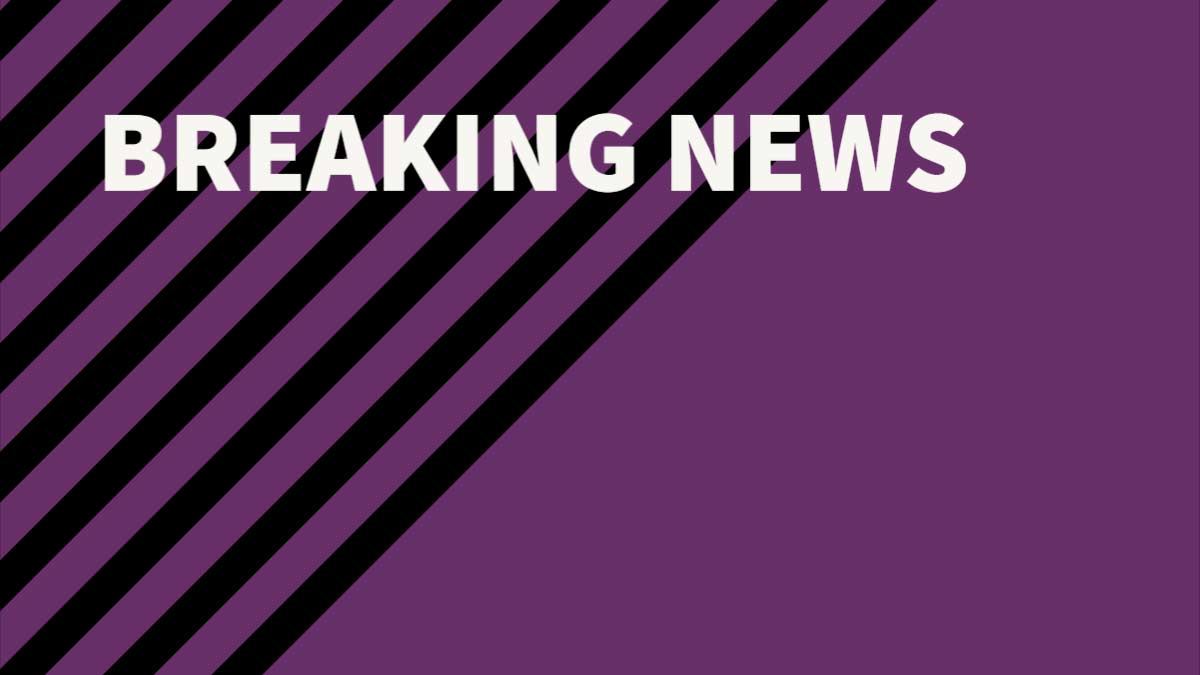 A purple and black graphic with the words breaking news in white letters