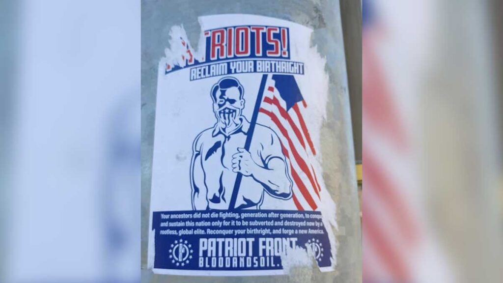 October 2018 Patriot Front flyer attacked to a light pole using the Nazi-era slogan, "blood and soil" on recruitment posters placed in Kirkland, Washington

The image is in red white and blue, and depicts a muscular man holding an American flag without stars, wearing a mask over their mouth. The words "reclaim your birthright" are on the top.
