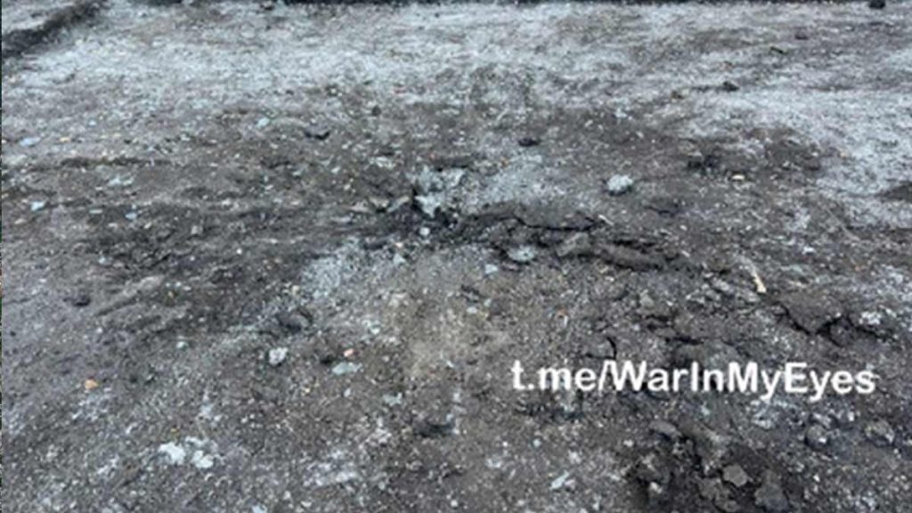 A Russian provided image of an impact crater from the January 21, 2024 attack on a Donetsk market by War In My Eyes shows damage and splash pattern consistent with a mortar round.