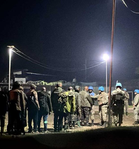 Congolese Army Soldiers in line to turn their weapons into U.N. peacekeepers in the Goma, Democratic Republic of Congo.