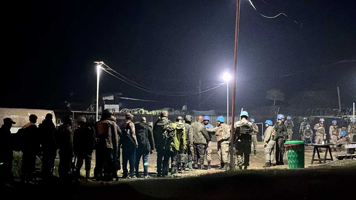 Congolese Army Soldiers in line to turn their weapons into U.N. peacekeepers in the Goma, Democratic Republic of Congo.