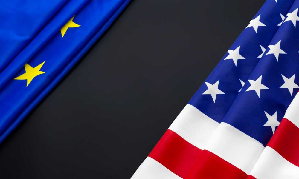 european union and united states flag with a large black area between