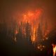 Wildfire in the mountains at night