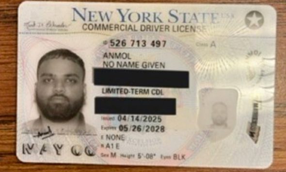 New York Driver's License with partially redacted information