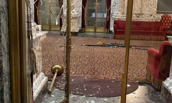 Smashed doors and other vandalism at the Washington State Capitol building in Olympia, Washington.