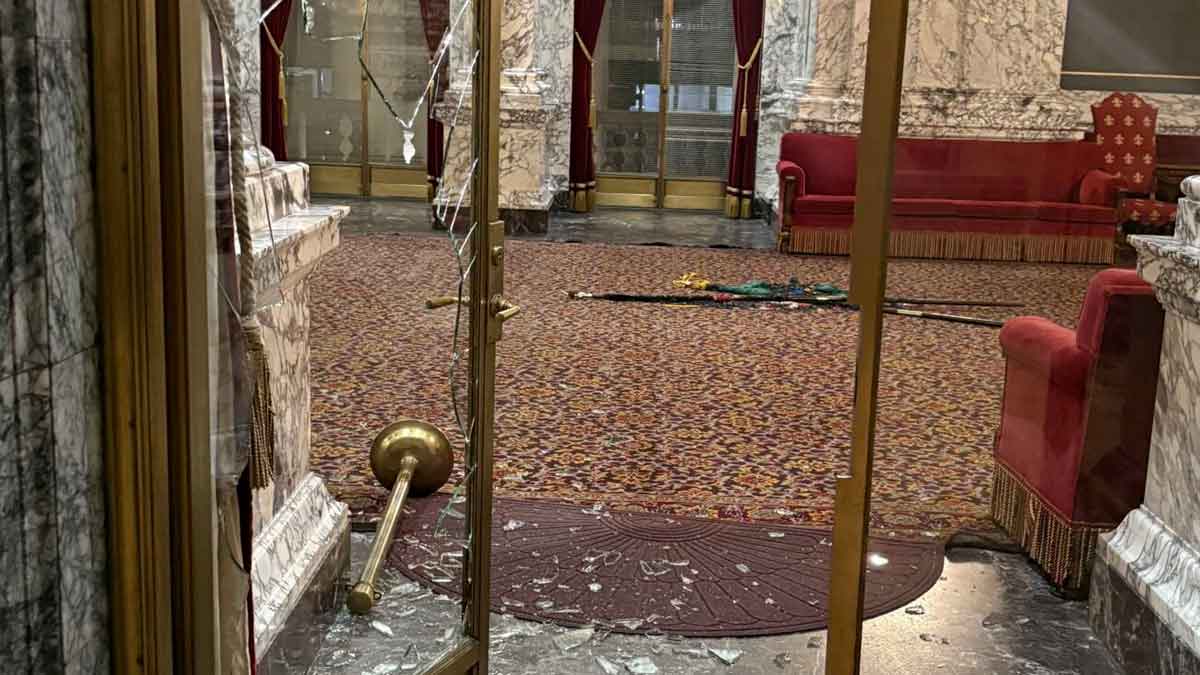 Smashed doors and other vandalism at the Washington State Capitol building in Olympia, Washington.