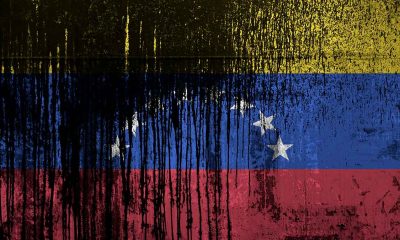 Computer generated image of the Venezuelan flag streaked with oil